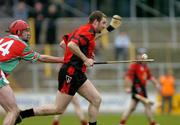 14 November 2004; Anthony O'Leary, Oulart-The-Ballagh, in action against Richie Hayes, James Stephens. AIB Leinster Senior Club Hurling Championship Semi Final, James Stephens v Oulart-The-Ballagh, Nowlan Park, Kilkenny. Picture credit; Matt Browne / SPORTSFILE