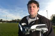 19 November 2004; Ireland and Leinster prop Reggie Corrigan launching the new Puma H8 rugby boot. Picture credit; Brendan Moran / SPORTSFILE