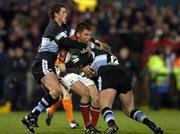 19 November 2004; Jonny Bell, Ulster, in action against Nick MacLeod, left, and Lee Thomas, Cardiff Blues. Celtic League 2004-2005, Ulster v Cardiff Blues, Ravenhill, Belfast. Picture credit; Matt Browne / SPORTSFILE