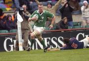 20 November 2004; Eric Miller, Ireland, goes past Gerard Klerck, USA, on his way to scoring a try. Rugby International, Ireland v USA, Lansdowne Road, Dublin. Picture credit; Damien Eagers / SPORTSFILE