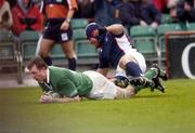 20 November 2004; Eric Miller, Ireland, scores his sides first try despite the attentions of Salesi Sika, USA. Rugby International, Ireland v USA, Lansdowne Road, Dublin. Picture credit; Damien Eagers / SPORTSFILE