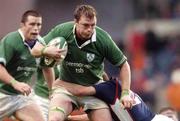 20 November 2004; Eric Miller, Ireland, supported by team-mate Marcus Horan breaks throught the tackle of David Williams, USA. Rugby International, Ireland v USA, Lansdowne Road, Dublin. Picture credit; Damien Eagers / SPORTSFILE