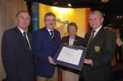 19 November 2004; Jim Lamont, right, President, Holywood Golf Club, who was presented with the AIB All-Ireland Junior Golf Award by Albert Lee, left, President, GUI, Ita  Butler, President, ILGU, and Billy Andrews, General Manager, AIB, at the 2004 AIB Golf Club of the Year Awards. AIB Bankcentre, Ballsbridge, Dublin. Picture credit; Ray McManus / SPORTSFILE