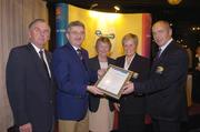 19 November 2004; Paul Quinn, right, Captain, Ann Healy,  Lady Captain, Enniscrone Golf Club, who were presented with the AIB Environment Award by Albert Lee, President, GUI, Ita  Butler, centre, President, ILGU, and Billy Andrews, General Manager, AIB, at the 2004 AIB Golf Club of the Year Awards. AIB Bankcentre, Ballsbridge, Dublin. Picture credit; Ray McManus / SPORTSFILE