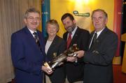 19 November 2004; Charlie McCarthy, Headfort Golf Club,  who was presented with the 2004 AIB Golf Club of the Year award by Albert Lee, right, President, GUI, Ita  Butler, President, ILGU, and Billy Andrews, left, General Manager, AIB, at the 2004 AIB Golf Club of the Year Awards. AIB Bankcentre, Ballsbridge, Dublin. Picture credit; Ray McManus / SPORTSFILE