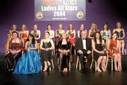 20 November 2004; The O'Neills / TG4 Ladies Football All-Stars of 2004, back row, from left, Annette Clarke, Galway, Claire Egan, Mayo, Lisa Cohill, Galway, Bernie Finlay, Dublin, Valerie Mulcahy, Cork, Mary Nevin, Dublin, Geraldine O'Shea, Kerry, Jackie Moran, Mayo, Emer Flaherty, Galway and Rena Buckley, Cork. Front, from left, Cliodhna O'Connor, Dublin, Christina Reilly, Monaghan, Ruth Stevens, Galway, Geraldine Giles, President of the Ladies Football Association, An Taoiseach Bertie Ahern TD, Helena Lohan, Mayo, and Louise Keegan, Dublin, at the O'Neills / TG4 Ladies Football All-Stars. Citywest, Dublin. Picture credit; Brendan Moran / SPORTSFILE