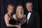 20 November 2004; Laura Power of Cork receives her Young Munster Ladies Player of the Year award from An Taoiseach Bertie Ahern TD and President of the Ladies Football Association Geraldine Giles at the O'Neills / TG4 Ladies Football All-Stars. Citywest, Dublin. Picture credit; Brendan Moran / SPORTSFILE