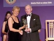 20 November 2004; Mick Fitzgerald of Kerry receives his Hall of Fame award from Geraldine Giles, President of the Ladies Football Association, at the O'Neills / TG4 Ladies Football All-Stars. Citywest, Dublin. Picture credit; Brendan Moran / SPORTSFILE