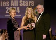 20 November 2004; Jackie Moran, on behalf of her team-mate Cora Staunton of Mayo, receives the Ladies Football All-Star award from An Taoiseach Bertie Ahern TD, and President of the Ladies Football Association Geraldine Giles at the O'Neills / TG4 Ladies Football All-Stars. Citywest, Dublin. Picture credit; Brendan Moran / SPORTSFILE