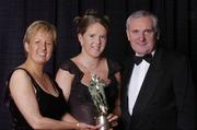 20 November 2004; Therese Marren of Sligo receives her Young Connacht Ladies Player of the Year award from An Taoiseach Bertie Ahern TD, and President of the Ladies Football Association Geraldine Giles at the O'Neills / TG4 Ladies Football All-Stars. Citywest, Dublin. Picture credit; Brendan Moran / SPORTSFILE