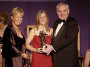 20 November 2004; Mary Nevin, Dublin, receives her Ladies Football All-Star award from An Taoiseach Bertie Ahern T.D. and President of the Ladies Football Association Geraldine Giles at the O'Neills / TG4 Ladies Football All-Stars. Citywest, Dublin. Picture credit; Pat Murphy / SPORTSFILE