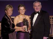 20 November 2004; Valerie Mulcahy, Cork, receives her Ladies Football All-Star award from An Taoiseach Bertie Ahern T.D. and President of the Ladies Football Association Geraldine Giles at the O'Neills / TG4 Ladies Football All-Stars. Citywest, Dublin. Picture credit; Pat Murphy / SPORTSFILE