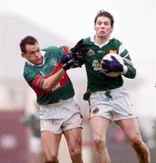 21 November 2004; Mike Burke, Milltown-Castlemaine,  in action against Odran O'Dwyer, Kilmurry-Ibrickane. AIB Munster Club Senior Football Championship Semi-Final, Kilmurry-Ibrickane v Milltown-Castlemaine, Pairc Naoimh Mhuire, Quilty, Co. Clare. Picture credit; Ray McManus / SPORTSFILE