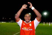 22 November 2004; Charles Mbabazi Livingstone, waves to the crowd  before the start of the game, Charles Mbabazi Livingstone Testimonial, St. Patrick's Athletic Selection v Brian Kerr Selection, Richmond Park, Dublin. Picture credit; David Maher / SPORTSFILE