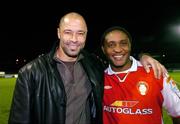 22 November 2004; Charles Mbabazi Livingstone, with former St. Patrick's Athletic and Republic of Ireland international Paul McGrath.  Charles Mbabazi Livingstone Testimonial, St. Patrick's Athletic Selection v Brian Kerr Selection, Richmond Park, Dublin. Picture credit; David Maher / SPORTSFILE