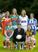 23 November 2004; The AIB Ladies Football All-Ireland Club Finals take place shortly with the Senior and  Junior Finals on Sunday next, 28th November and the Intermediate Final on Sunday 5th December. Pictured at a photocall ahead of the FInals are, back, from left, Intermediate Finalsts, Sarah Fullerton of Tyholland, Monaghan and Sile Sammon of St Brigid's, Roscommon, Senior Finalists Juliet Murphy, Donaghmore, Cork and Karen Hopkins, Ballyboden St Endas, Dublin. Front, from left, are, Junior Finalists, Voureen Quigley of Inniskeen, Monaghan and Noreen Fealy of Abbeydorney, Kerry, with Billy Finn of AIB. AIB Bankcentre, Ballsbridge, Dublin. Picture credit; Brendan Moran / SPORTSFILE