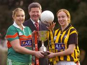23 November 2004; Opposing players in the AIB All-Ireland Ladies Club Junior Football Final, Voureen Quigley, left, of Inniskeen, Monaghan, and Noreen Fealy of Abbeydorney, Kerry, with Billy Finn, AIB, at a photocall ahead of the AIB Ladies Football All-Ireland Club Finals with the Senior and Junior Finals on Sunday next, 28th November, and the Intermediate Final on Sunday 5th December. AIB Bankcentre, Ballsbridge, Dublin. Picture credit; Brendan Moran / SPORTSFILE