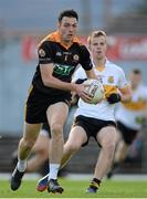 20 October 2013; Paul O'Donoghue, Austin Stacks, in action against Fionn Fitzgerald, Dr. Crokes. Kerry County Senior Club Football Championship Final, Dr. Crokes v Austin Stacks, Fitzgerald Stadium, Killarney, Co. Kerry. Picture credit: Brendan Moran / SPORTSFILE