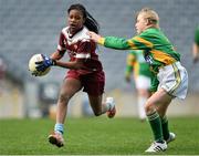 5 November 2013; Favour Offoma, Huntstown N.S., Dublin, in action against Mary Spencer, St. Patrick's G.N.S. Ringsend, Dublin. Allianz Cumann na mBunscol Football Finals, Croke Park, Dublin. Picture credit: Barry Cregg / SPORTSFILE