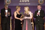 20 November 2004; Laura Power of Cork is presented with the Young Munster Player of the Year by Geraldine Giles, President of the Ladies Football Association, in the company of Tony Towell of O'Neills, left, and Pol O Geallachoir of TG4, at the O'Neills / TG4 Ladies Football All-Stars. Citywest, Dublin. Picture credit; Brendan Moran / SPORTSFILE