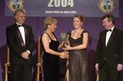 20 November 2004; Therese Marren of Sligo is presented with the Young Connacht Player of the Year by Geraldine Giles, President of the Ladies Football Association, in the company of Tony Towell of O'Neills, left, and Pol O Geallachoir of TG4, at the O'Neills / TG4 Ladies Football All-Stars. Citywest, Dublin. Picture credit; Brendan Moran / SPORTSFILE