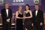 20 November 2004; Catriona McConnell of Monaghan is presented with the Young Ulster Player of the Year by Geraldine Giles, President of the Ladies Football Association, in the company of Tony Towell of O'Neills, left, and Pol O Geallachoir of TG4, at the O'Neills / TG4 Ladies Football All-Stars. Citywest, Dublin. Picture credit; Brendan Moran / SPORTSFILE