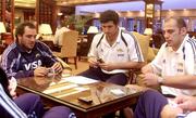 25 November 2004; Argentinian players, l to r, Rodrigo Roncero, Hernan Senillosa and Mario Ledesna play a game of cards after a press briefing. Burlington Hotel, Dublin. Picture credit; Damien Eagers / SPORTSFILE