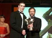 26 November 2004; Barry Owens of Fermanagh, is presented with his All-Star award by Sean Kelly, President of the GAA, at the 2004 Vodafone GAA All-Star Awards. Citywest, Dublin. Picture credit; Brendan Moran / SPORTSFILE