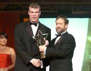 26 November 2004; Diarmuid Murphy of Kerry, is presented with his All-Star award by Sean Kelly, President of the GAA, at the 2004 Vodafone GAA All-Star Awards. Citywest, Dublin. Picture credit; Brendan Moran / SPORTSFILE