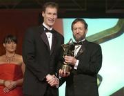 26 November 2004; James Nallen of Mayo, is presented with his All-Star award by Sean Kelly, President of the GAA, at the 2004 Vodafone GAA All-Star Awards. Citywest, Dublin. Picture credit; Brendan Moran / SPORTSFILE