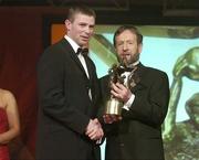 26 November 2004; Tomas O Se of Kerry, is presented with his All-Star award by Sean Kelly, President of the GAA, at the 2004 Vodafone GAA All-Star Awards. Citywest, Dublin. Picture credit; Brendan Moran / SPORTSFILE