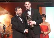 26 November 2004; Dan Shanahan of Waterford, is presented with his All-Star award by Sean Kelly, President of the GAA, at the 2004 Vodafone GAA All-Star Awards. Citywest, Dublin. Picture credit; Brendan Moran / SPORTSFILE