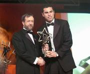 26 November 2004; Sean Og O hAilpin of Cork, is presented with his All-Star award by Sean Kelly, President of the GAA, at the 2004 Vodafone GAA All-Star Awards. Citywest, Dublin. Picture credit; Brendan Moran / SPORTSFILE