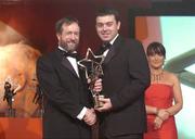 26 November 2004; Paul Flynn of Waterford, is presented with his All-Star award by Sean Kelly, President of the GAA, at the 2004 Vodafone GAA All-Star Awards. Citywest, Dublin. Picture credit; Brendan Moran / SPORTSFILE