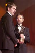 26 November 2004; Enda Muldoon of Derry, is presented with his All-Star award by Sean Kelly, President of the GAA, at the 2004 Vodafone GAA All-Star Awards. Citywest, Dublin. Picture credit; Ray McManus / SPORTSFILE