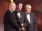 26 November 2004; Brian Murphy of Cork, is presented with the Young Hurler of the Year by An Taoiseach Bertie Ahern TD, in the company of Paul Donovan, Chief Executive, Vodafone Ireland, at the 2004 Vodafone GAA All-Star Awards. Citywest, Dublin. Picture credit; Ray McManus / SPORTSFILE
