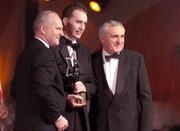 26 November 2004; Niall Tinney of Fermanagh, is presented with the Young Footballer of the Year by An Taoiseach Bertie Ahern TD, in the company of Paul Donovan, Chief Executive, Vodafone Ireland, at the 2004 Vodafone GAA All-Star Awards. Citywest, Dublin. Picture credit; Ray McManus / SPORTSFILE