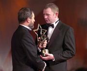 26 November 2004; Damien Fitzhenry of Wexford, is presented with his All-star award by Sean Kelly, President of the GAA, at the 2004 Vodafone GAA All-Star Awards. Citywest, Dublin. Picture credit; Ray McManus / SPORTSFILE