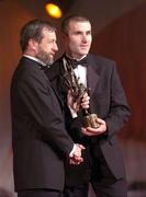 26 November 2004; Jerry O'Connor of Cork, is presented with his All-Star award by Sean Kelly, President of the GAA, at the 2004 Vodafone GAA All-Star Awards. Citywest, Dublin. Picture credit; Ray McManus / SPORTSFILE