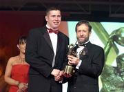 26 November 2004; Sean Cavanagh of Tyrone, is presented with his All-Star award by Sean Kelly, President of the GAA, at the 2004 Vodafone GAA All-Star Awards. Citywest, Dublin. Picture credit; Brendan Moran / SPORTSFILE