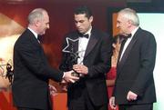 26 November 2004; Sean Og O hAilpin of Cork, is presented with the Hurler of the Year award by Paul Donovan, Chief Executive, Vodafone Ireland, in the company of An Taoiseach Bertie Ahern TD, at the 2004 Vodafone GAA All-Star Awards. Citywest, Dublin. Picture credit; Brendan Moran / SPORTSFILE