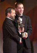 26 November 2004; Ken McGrath of Waterford, is presented with his All-Star award by Sean Kelly, President of the GAA, at the 2004 Vodafone GAA All-Star Awards. Citywest, Dublin. Picture credit; Ray McManus / SPORTSFILE