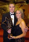 26 November 2004; Cork hurler Niall McCarthy with Clair Herbert and his All-Star award at the 2004 Vodafone GAA All-Star Awards. Citywest, Dublin. Picture credit; Ray McManus / SPORTSFILE