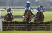 27 November 2004; Mossy Green (centre) with David Condon up, clears the last on the way to winning the Shelbourne Development Hurdle from Augherskea with Niall Madden, right, and Rockstown Boy with Denis Russell. Fairyhouse Racecourse, Co. Meath. Picture credit; Damien Eagers / SPORTSFILE