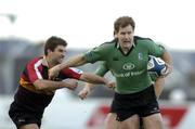 28 November 2004; Matt Mostyn, Connacht, in action against Bareth Baber, The Dragons. Celtic League 2004-2005, Connacht v The Dragons, Sportsground, Galway. Picture credit; Matt Browne / SPORTSFILE