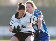 28 November 2004; Sarah O'Connell, Donaghmore, in action against Orla Scolard, Ballyboden St. Enda's. AIB Ladies Club All-Ireland Senior Football Final, Donaghmore v Ballyboden St. Enda's, St. Brendan's Park, Birr, Co. Offaly. Picture credit; Pat Murphy / SPORTSFILE