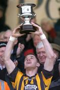 28 November 2004; Tony McEntee, Crossmaglen Rangers captain, lifts the Ulster Club trophy, after victory over Mayobridge. AIB Ulster Club Senior Football Final, Crossmaglen Rangers v Mayobridge, Casement Park, Belfast. Picture credit; David Maher / SPORTSFILE