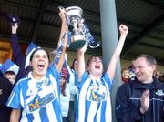 28 November 2004; Ballyboden St. Enda's captain Karen Hopkins lifts the Dolores Tyrrell Memorial Cup with team-mate Aisling Farrelly, right, in the presence of manager Bill Daly. AIB Ladies Club All-Ireland Senior Football Final, Donaghmore v Ballyboden St. Enda's, St. Brendan's Park, Birr, Co. Offaly. Picture credit; Pat Murphy / SPORTSFILE