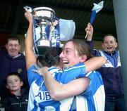28 November 2004; Ballyboden St. Enda's captain Karen Hopkins with team-mate Aisling Farrelly, right, lifts the Dolores Tyrrell Memorial Cup. AIB Ladies Club All-Ireland Senior Football Final, Donaghmore v Ballyboden St. Enda's, St. Brendan's Park, Birr, Co. Offaly. Picture credit; Pat Murphy / SPORTSFILE