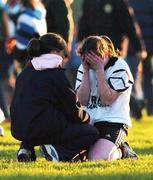 28 November 2004; Aisling O'Connor, Donaghmore, is consoled by a supporter after the final whistle. AIB Ladies Club All-Ireland Senior Football Final, Donaghmore v Ballyboden St. Enda's, St. Brendan's Park, Birr, Co. Offaly. Picture credit; Pat Murphy / SPORTSFILE